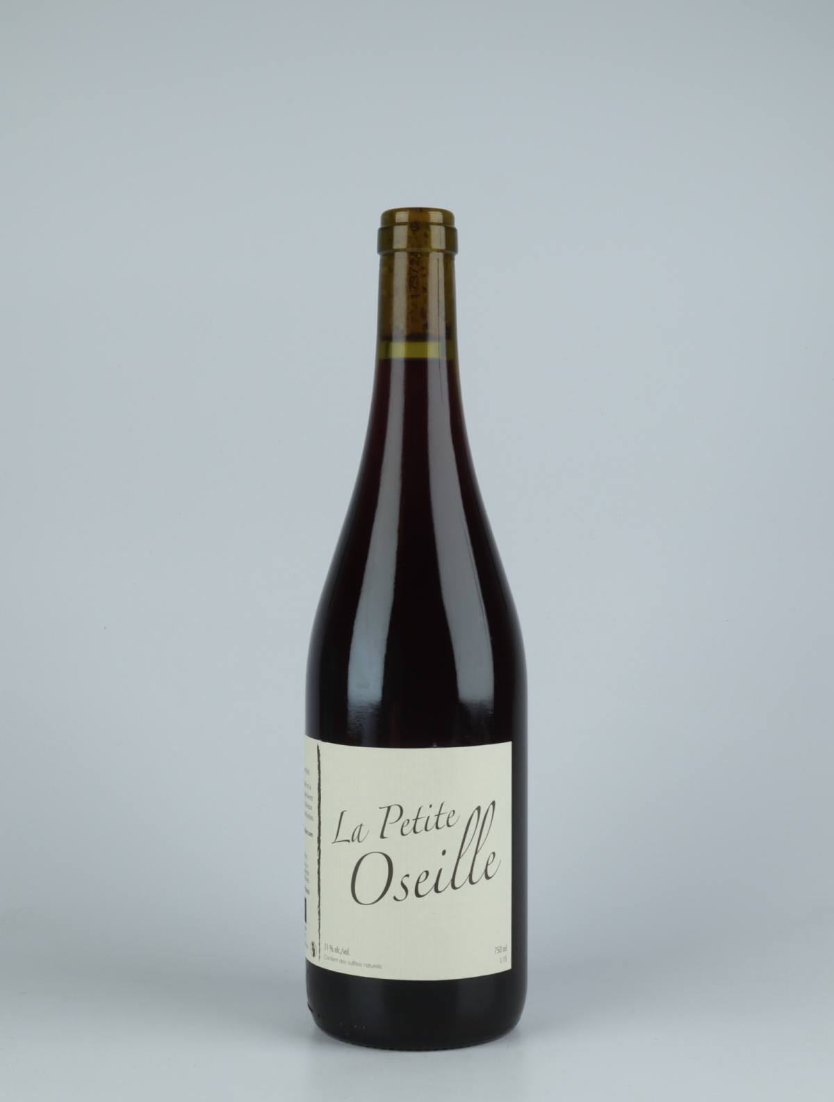 A bottle 2015 La Petite Oseille Red wine from Michel Guignier, Beaujolais in France