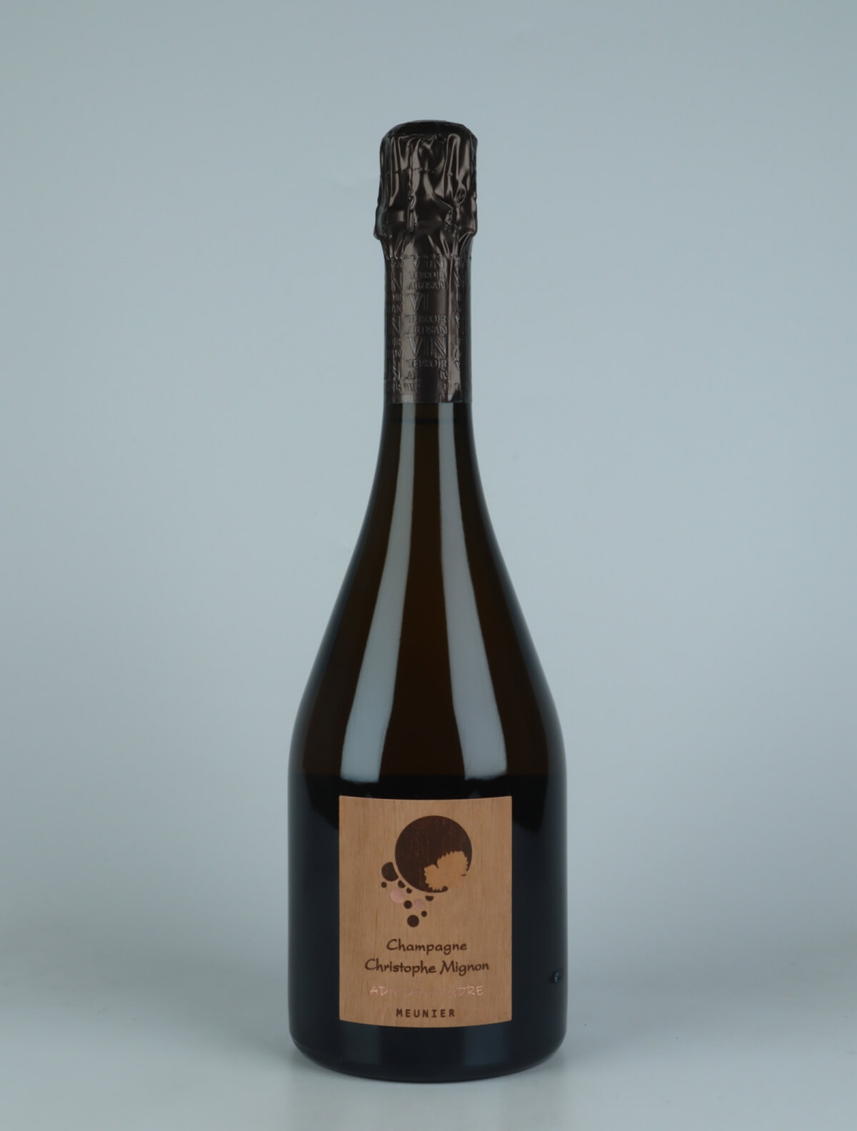 A bottle 2017 ADN de Foudre Meunier Brut Nature Sparkling from Christophe Mignon, Champagne in France