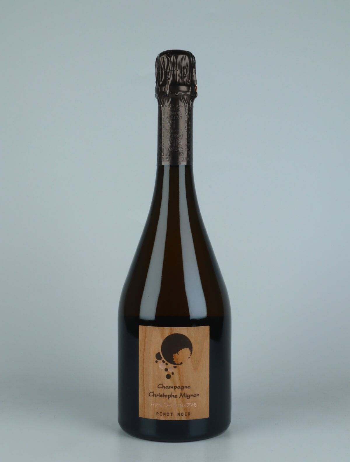 A bottle 2017 ADN de Foudre Pinot Noir Brut Nature Sparkling from Christophe Mignon, Champagne in France