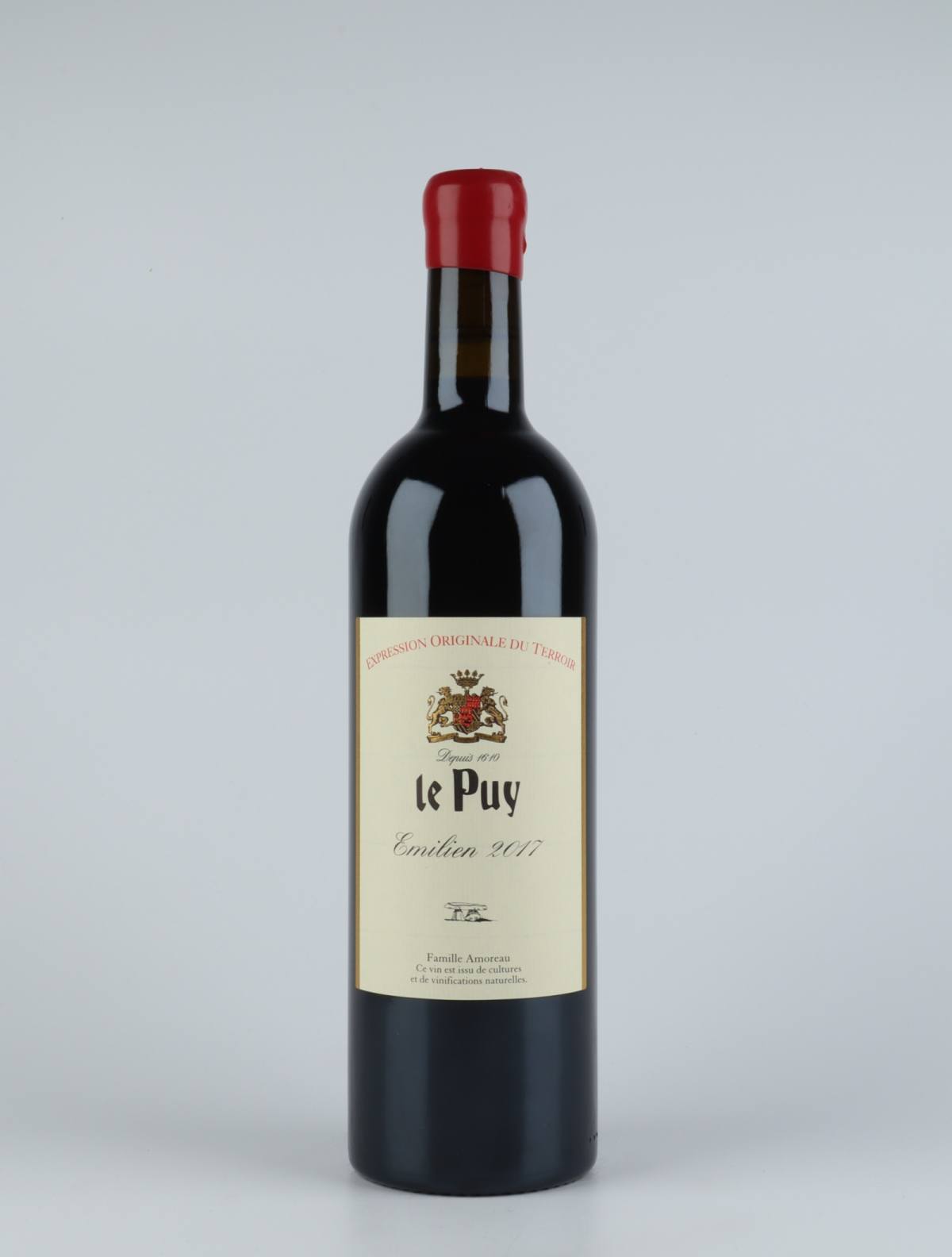 A bottle 2017 Emilien Red wine from Château le Puy, Bordeaux in France