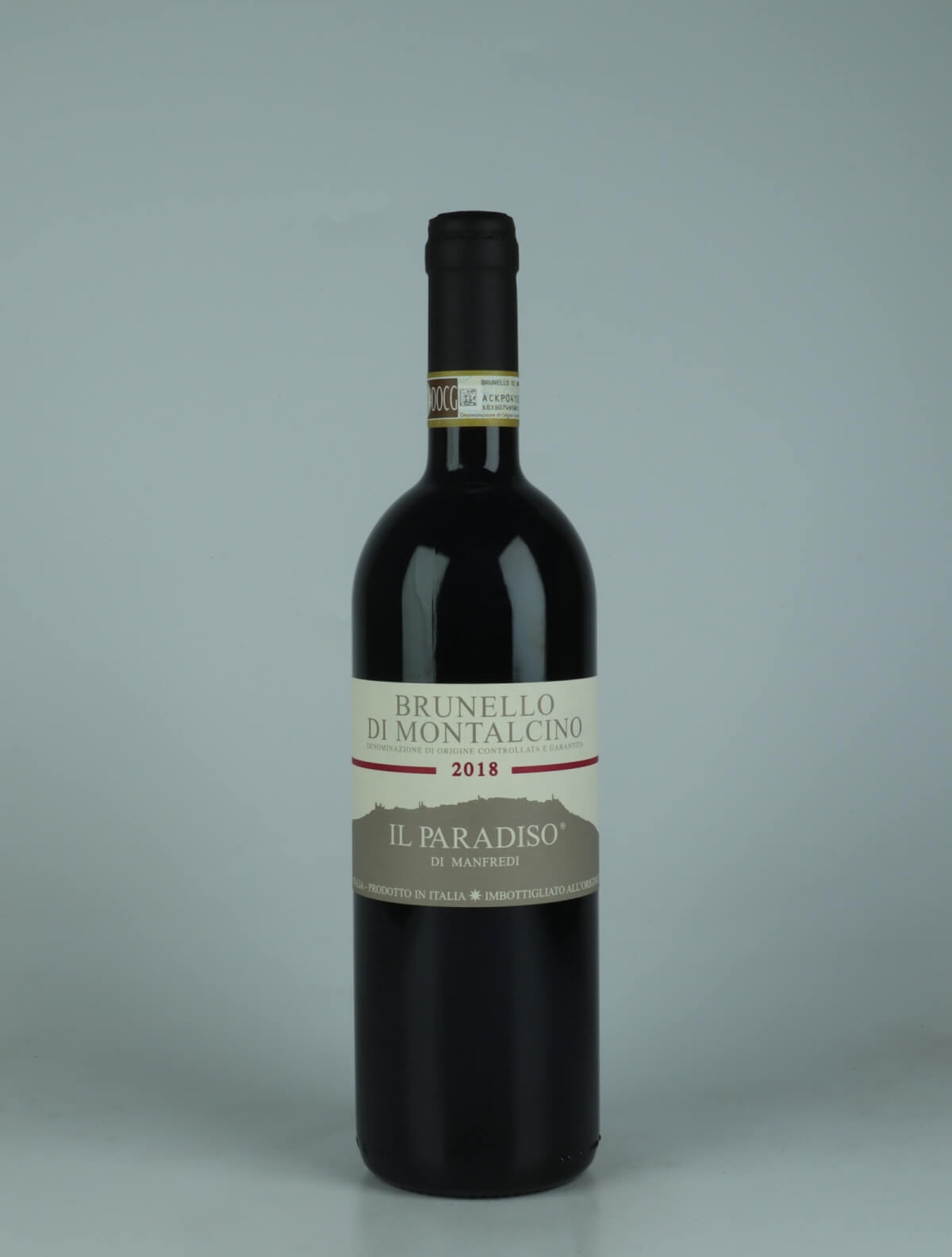 A bottle 2018 Brunello di Montalcino Red wine from Il Paradiso di Manfredi, Tuscany in Italy