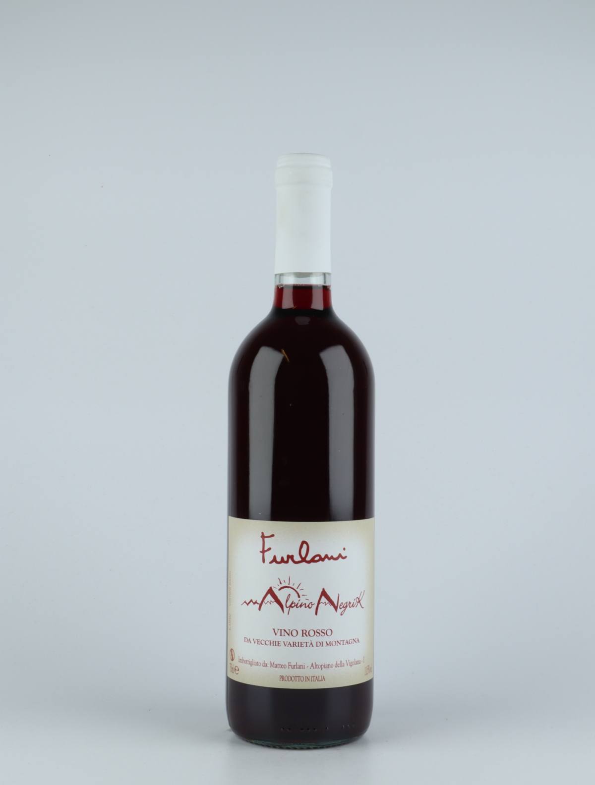 A bottle 2018 Rosso Alpino Negrik Red wine from Cantina Furlani, Alto Adige in Italy