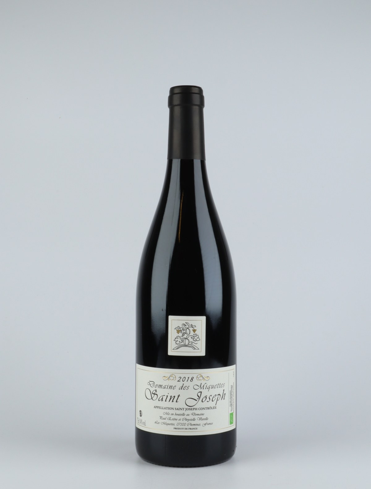 A bottle 2018 Saint-Joseph Rouge Red wine from Domaine des Miquettes, Rhône in France