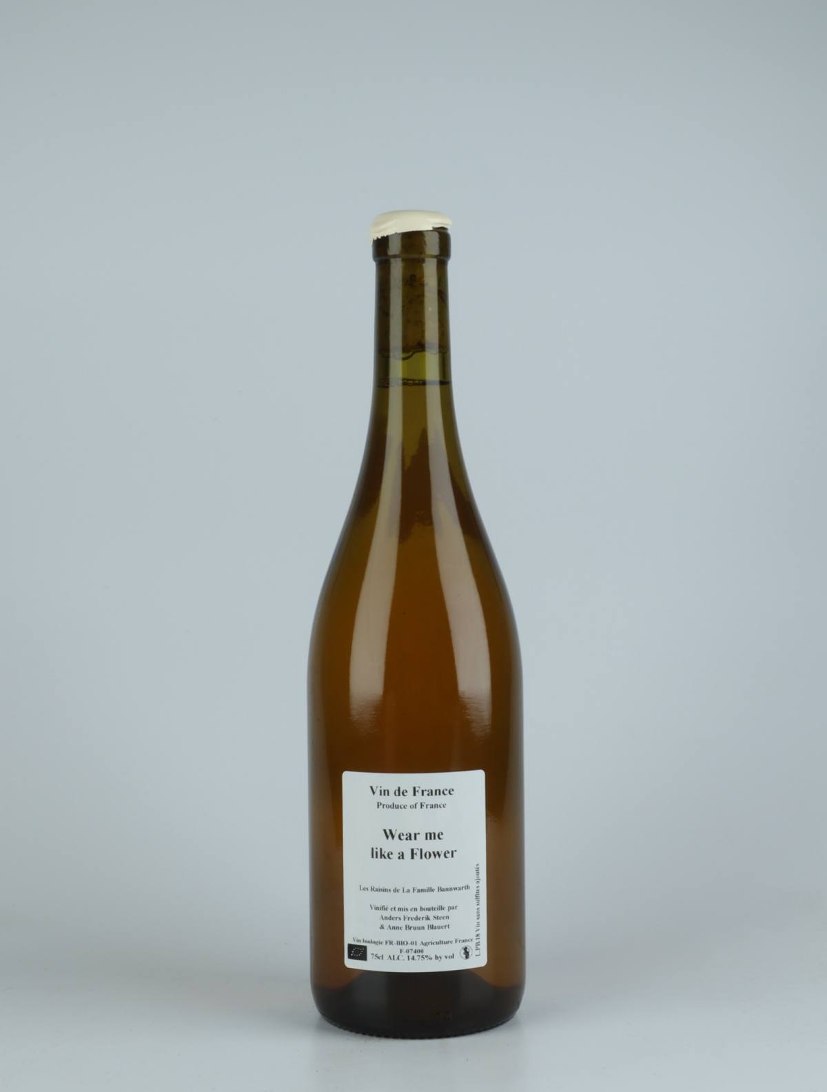 A bottle 2018 Wear me like a flower White wine from Anders Frederik Steen & Anne Bruun Blauert, Ardèche in France