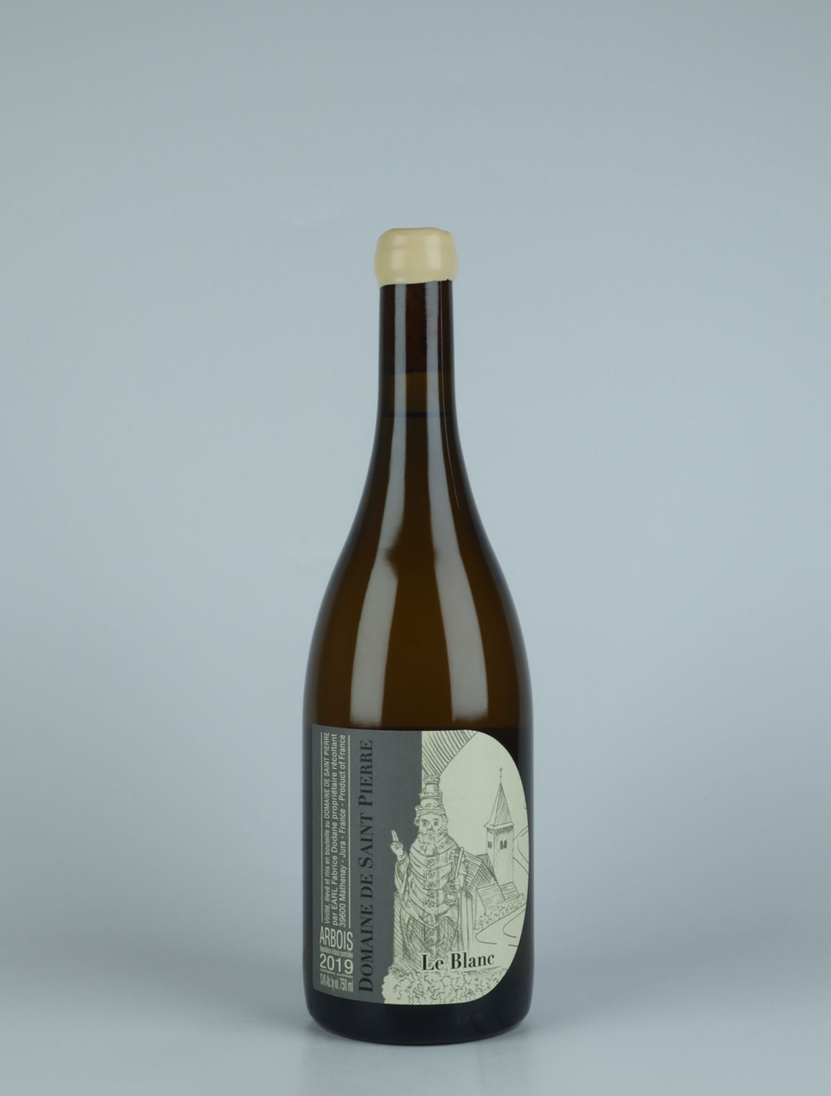 A bottle 2019 Arbois Blanc - Les Blanc Vin White wine from Domaine de Saint Pierre, Jura in France