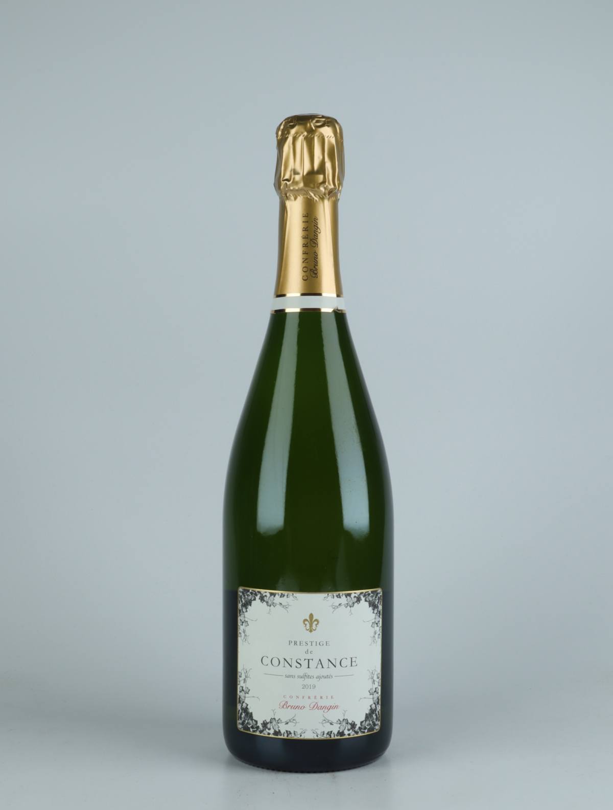A bottle 2019 Crémant Extra Brut - Prestige de Constance Sparkling from Domaine Bruno Dangin, Burgundy in France