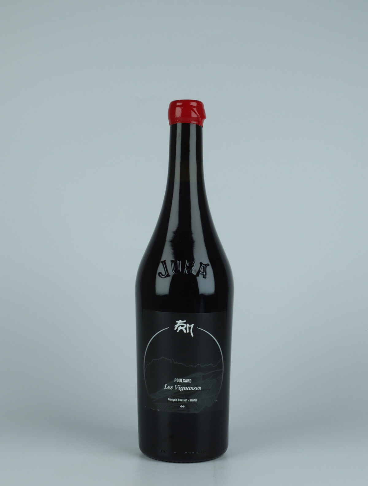 A bottle 2019 Les Vignasses - Poulsard Red wine from François Rousset-Martin, Jura in France