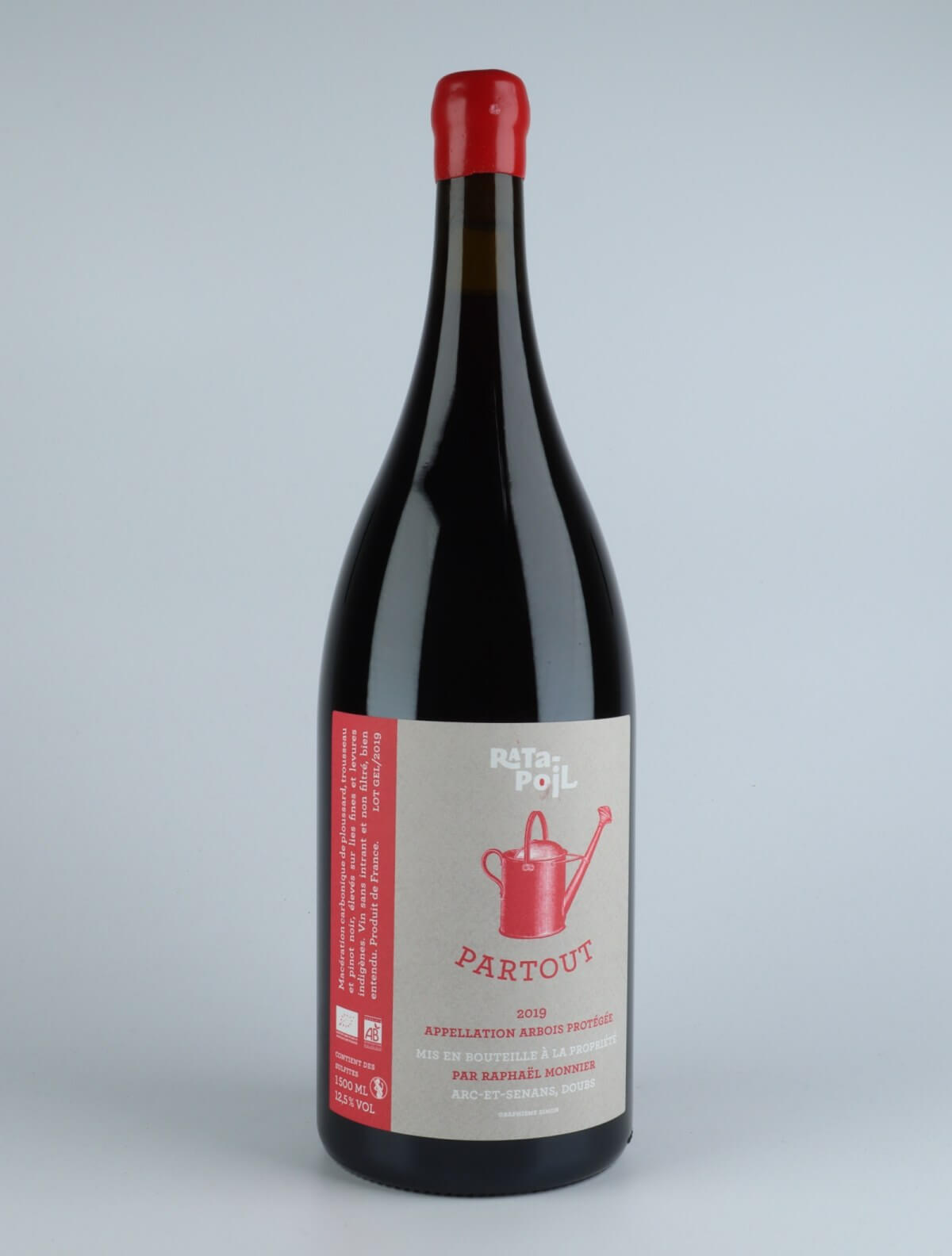 A bottle 2019 Partout Red wine from Domaine Ratapoil, Jura in France