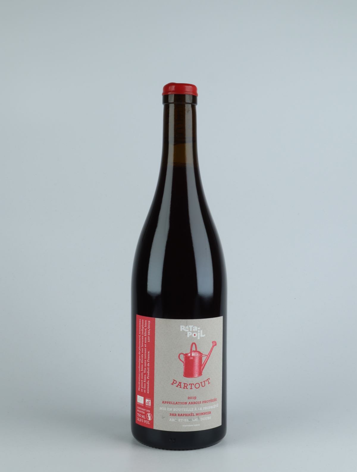 A bottle 2019 Partout Red wine from Domaine Ratapoil, Jura in France