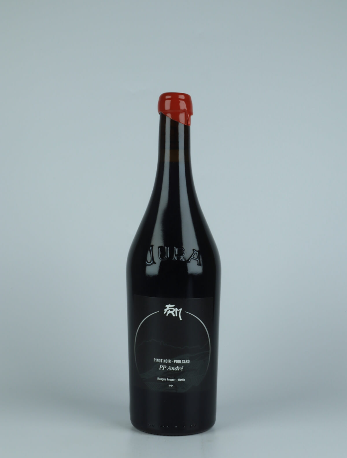 A bottle 2019 PP André - Poulsard & Pinot Noir Red wine from François Rousset-Martin, Jura in France