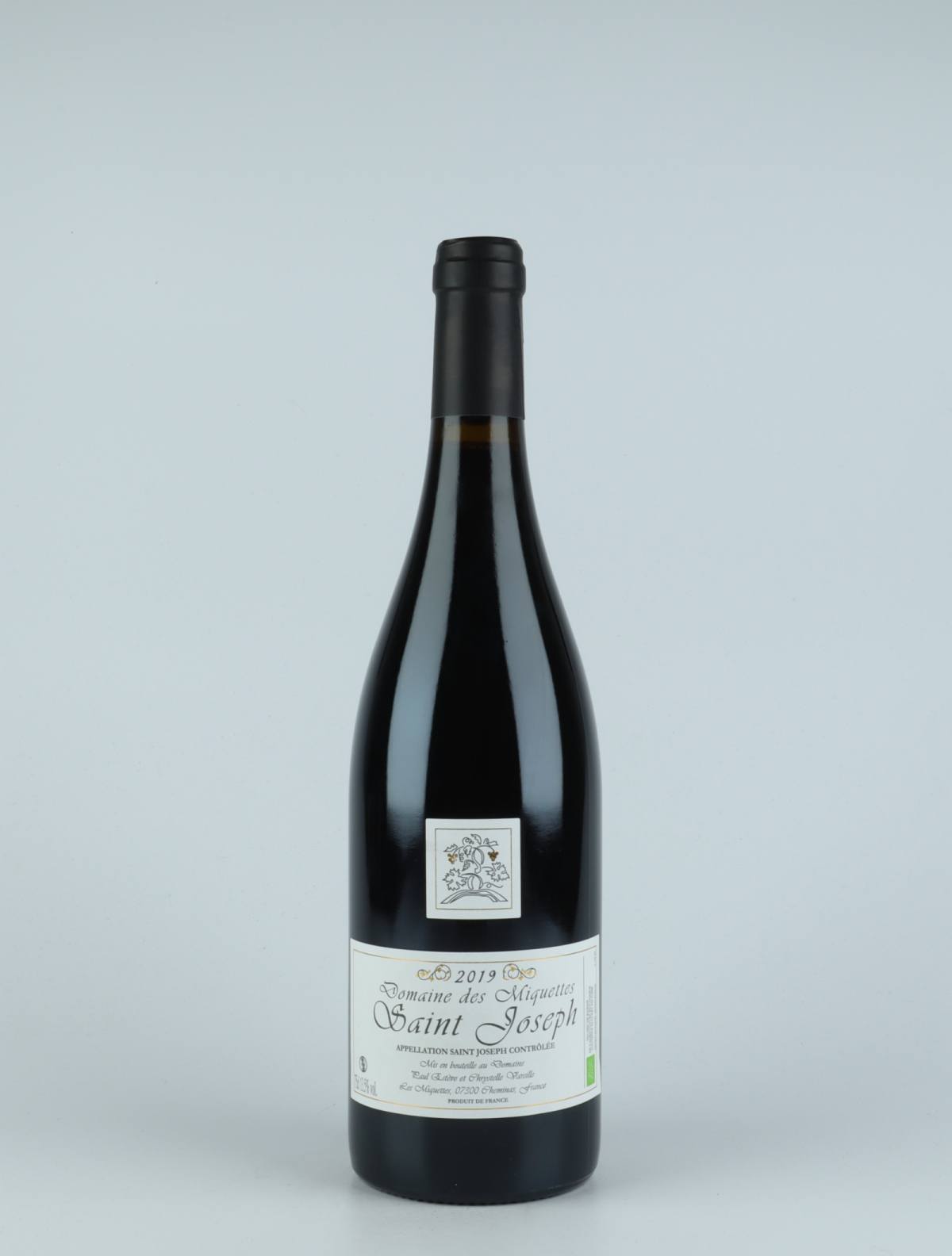 A bottle 2019 Saint-Joseph Rouge Red wine from Domaine des Miquettes, Rhône in France