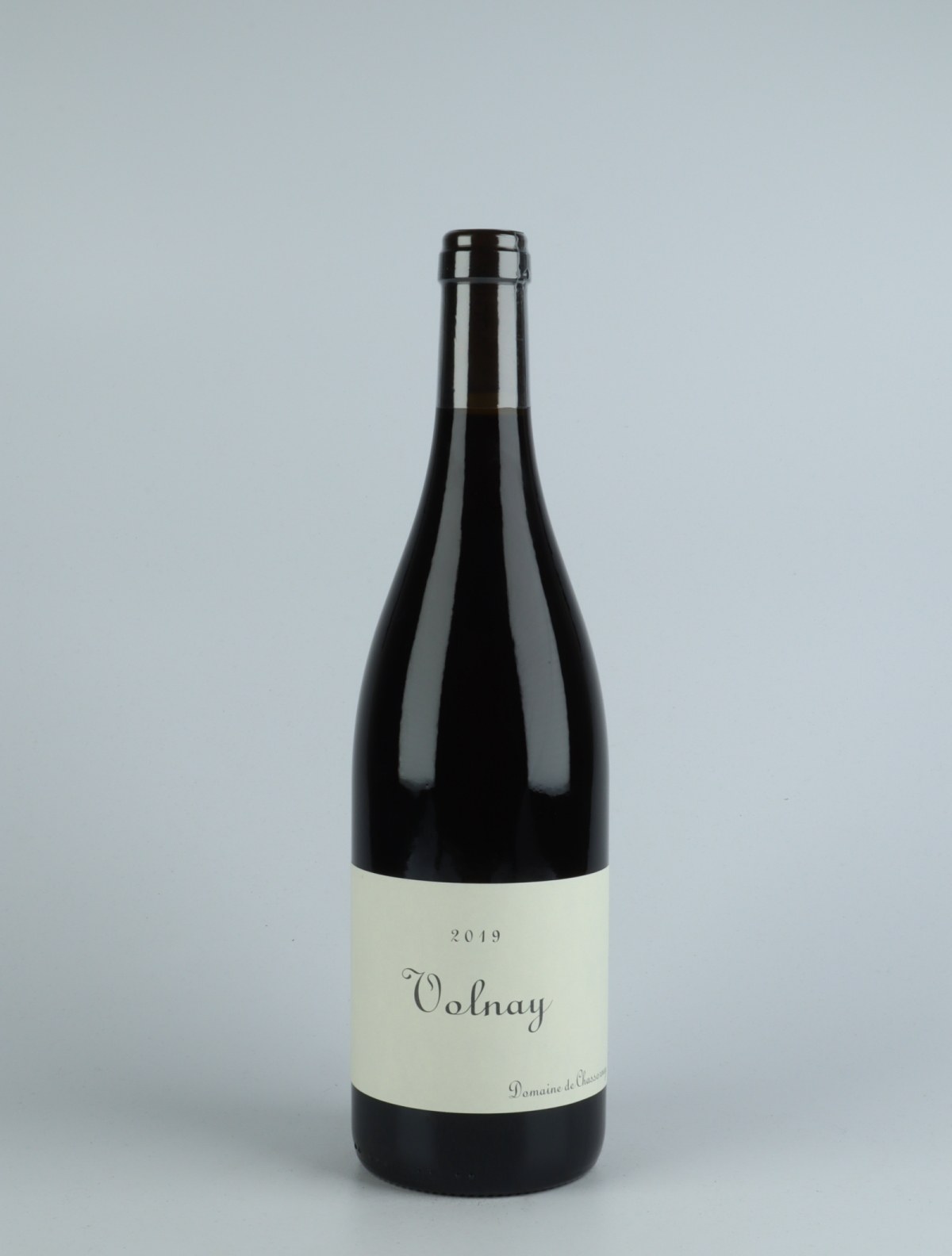 A bottle 2019 Volnay Red wine from Domaine de Chassorney, Burgundy in France