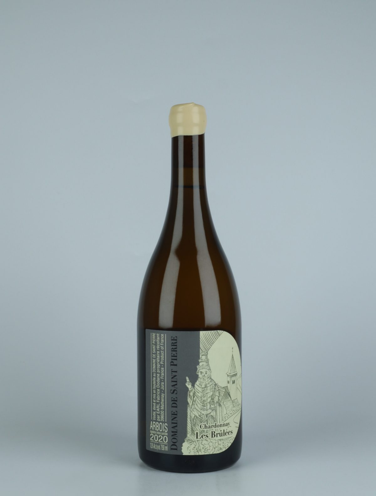 A bottle 2020 Arbois Blanc - Cuvée les Brulées White wine from Domaine de Saint Pierre, Jura in France