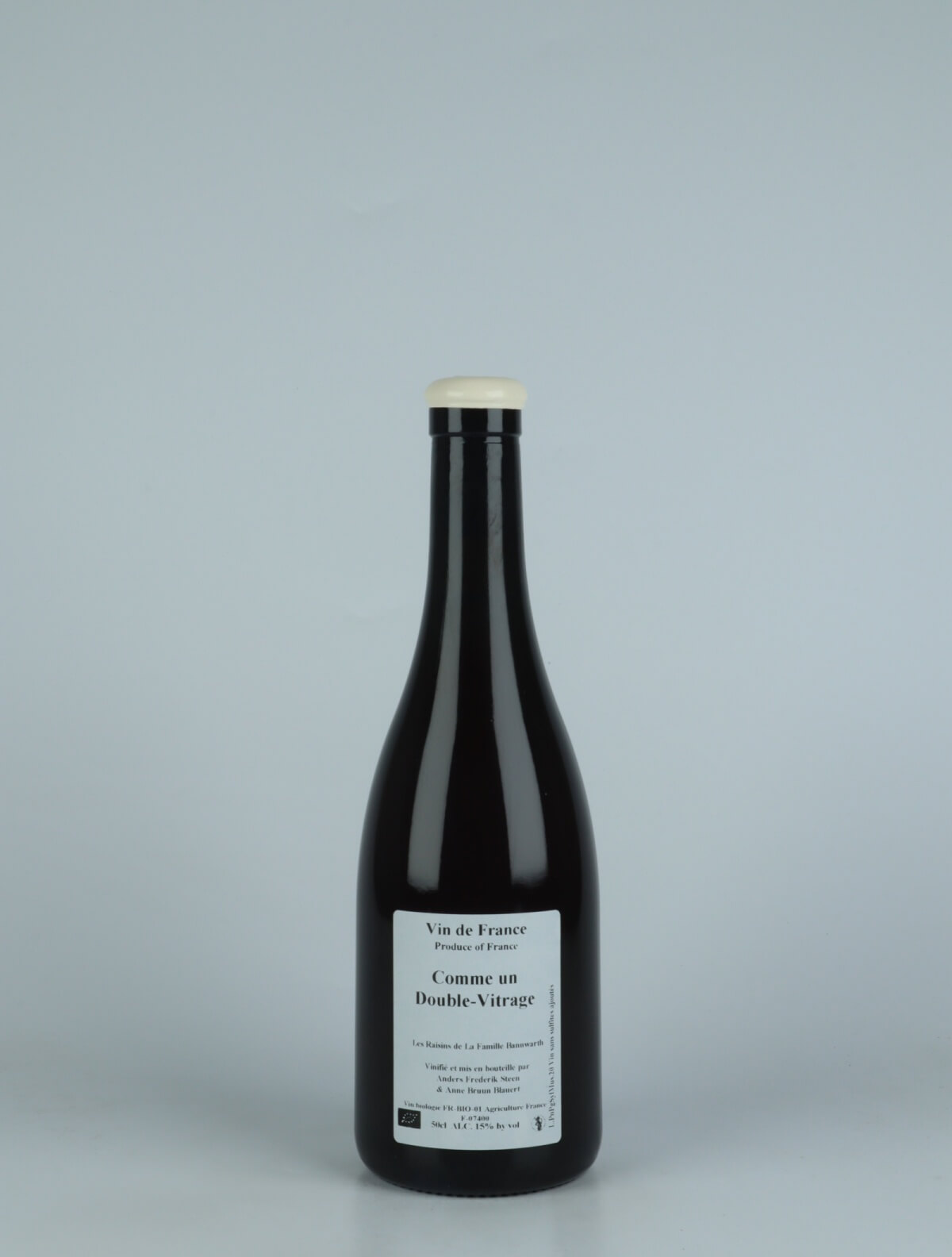 A bottle 2020 Comme un Double-Vitrage Rosé from Anders Frederik Steen & Anne Bruun Blauert, Ardèche in France