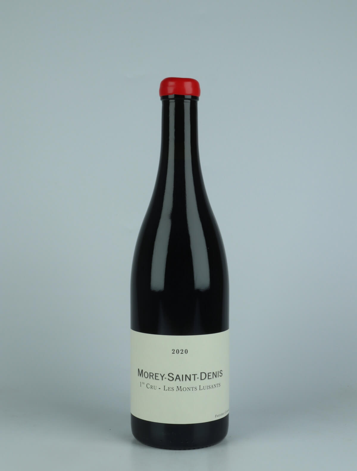 A bottle 2020 Morey Saint Denis 1. Cru - Les Monts Luisants Red wine from Frédéric Cossard, Burgundy in France