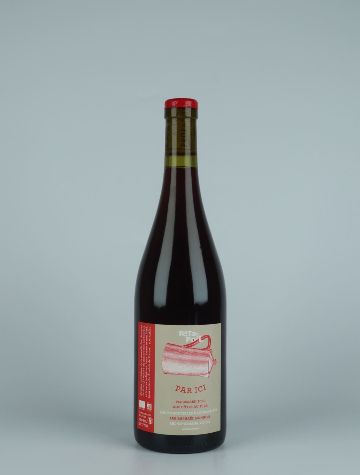 A bottle 2020 Par Ici - Ploussard Red wine from Domaine Ratapoil, Jura in France