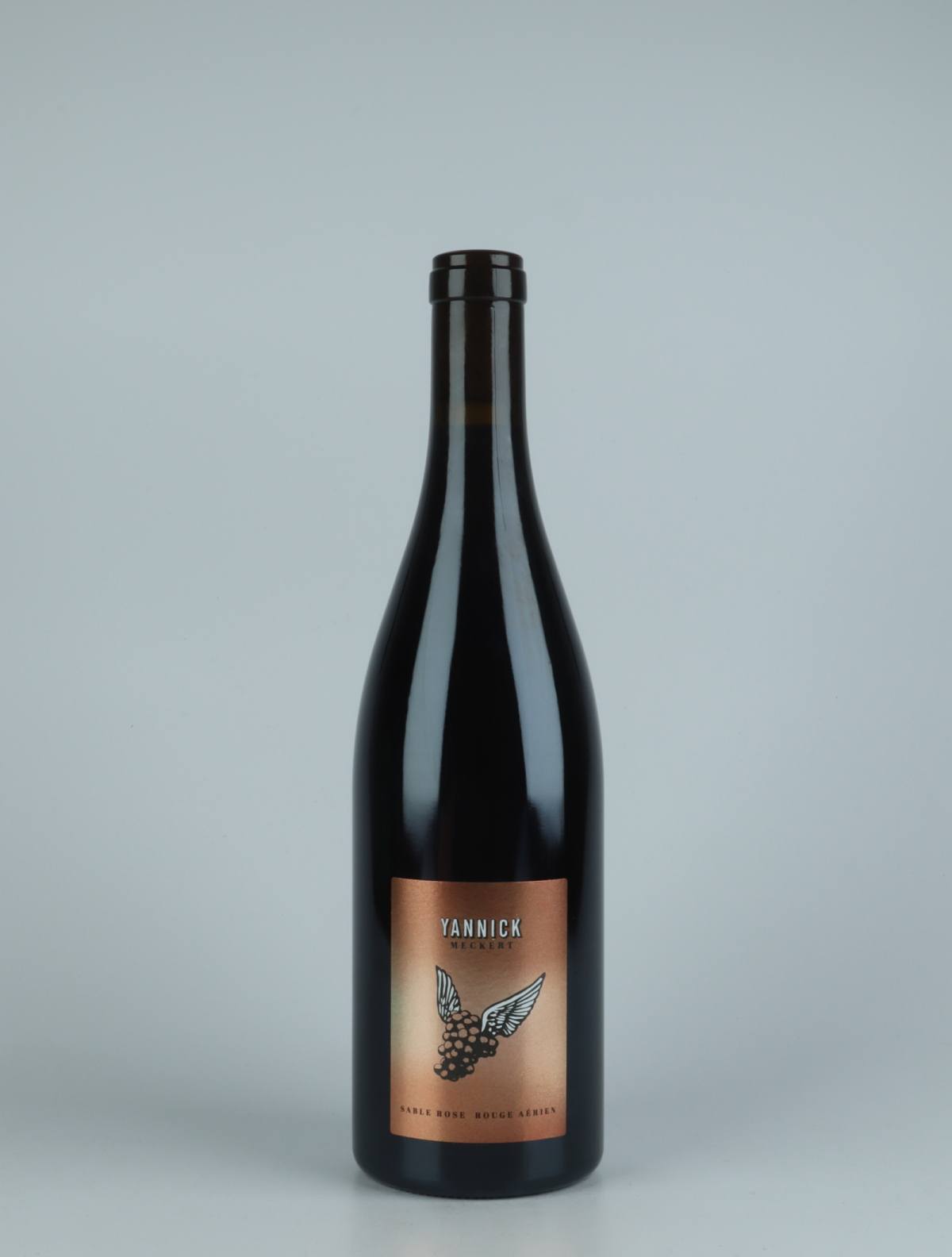 A bottle 2020 Pinot Noir - Sable Rose Rouge Aérien Red wine from Yannick Meckert, Alsace in France