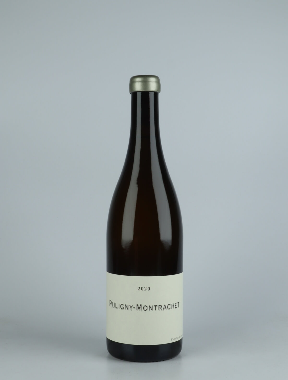 A bottle 2020 Puligny Montrachet White wine from Frédéric Cossard, Burgundy in France