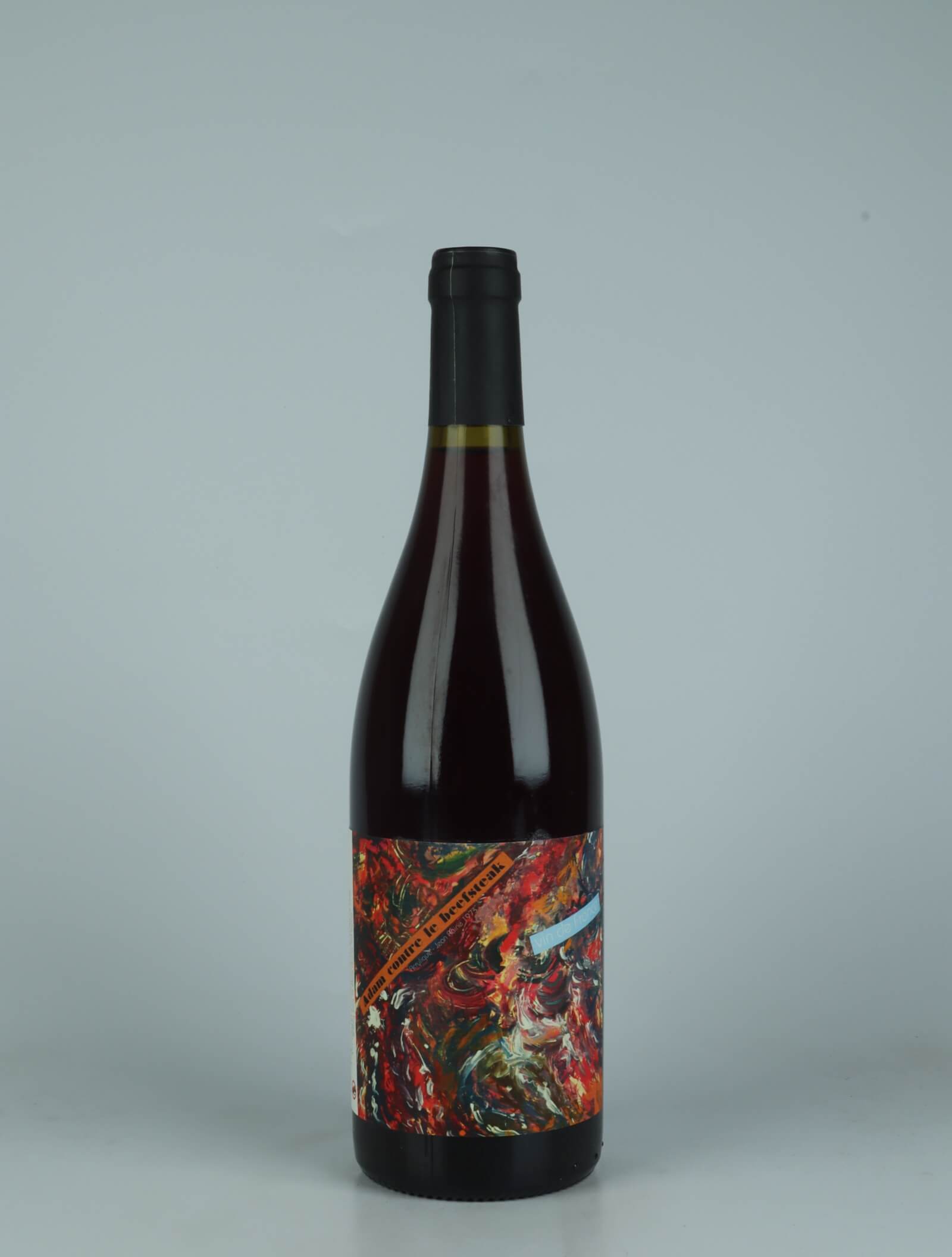 A bottle 2021 Adam Contre le Beefsteack Red wine from Daniel Sage, Haute-Loire in France