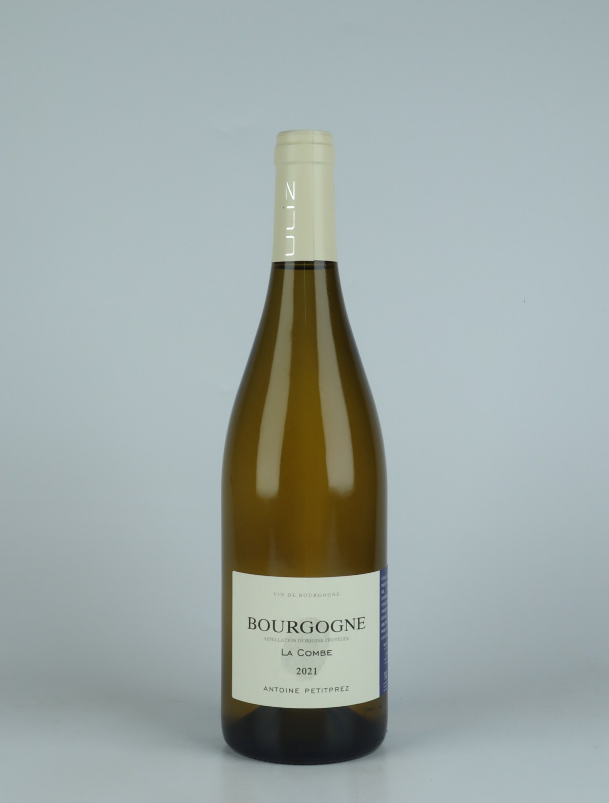 A bottle 2021 Bourgogne Blanc - La Combe White wine from Antoine Petitprez, Burgundy in France