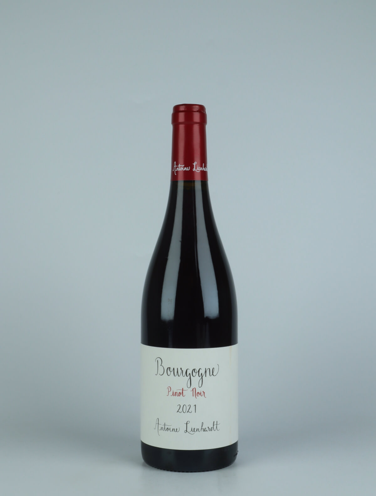 A bottle 2021 Bourgogne Rouge Red wine from Antoine Lienhardt, Burgundy in France