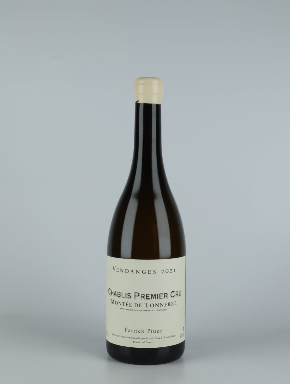 A bottle 2021 Chablis 1. Cru - Montée de Tonnerre White wine from Patrick Piuze, Burgundy in France