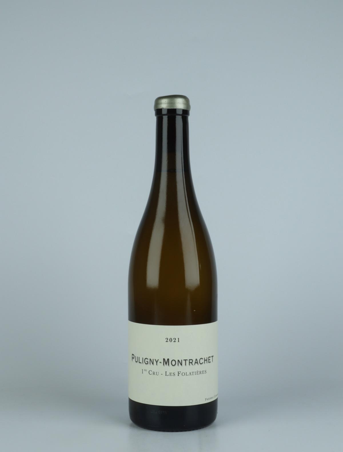 A bottle 2021 Puligny Montrachet 1. Cru - Folatières White wine from Frédéric Cossard, Burgundy in France