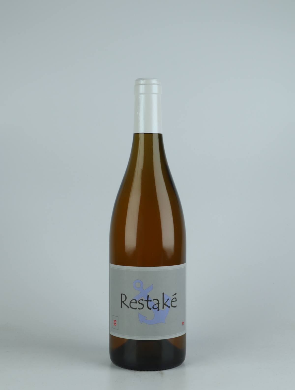 A bottle 2021 Restaké White wine from Domaine Yoyo, Rousillon in France