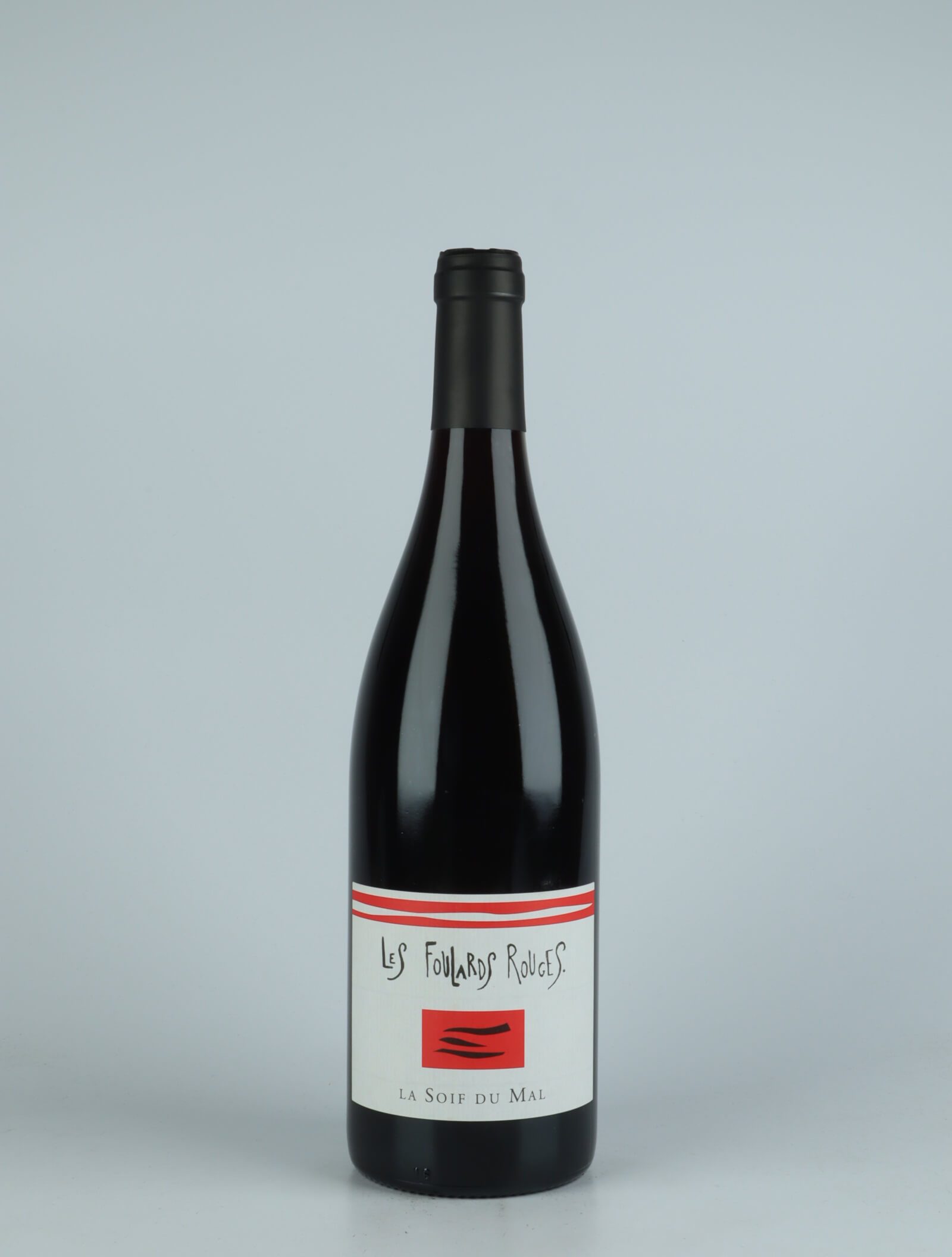 A bottle 2021 Soif du Mal Rouge Red wine from Les Foulards Rouges, Languedoc in France