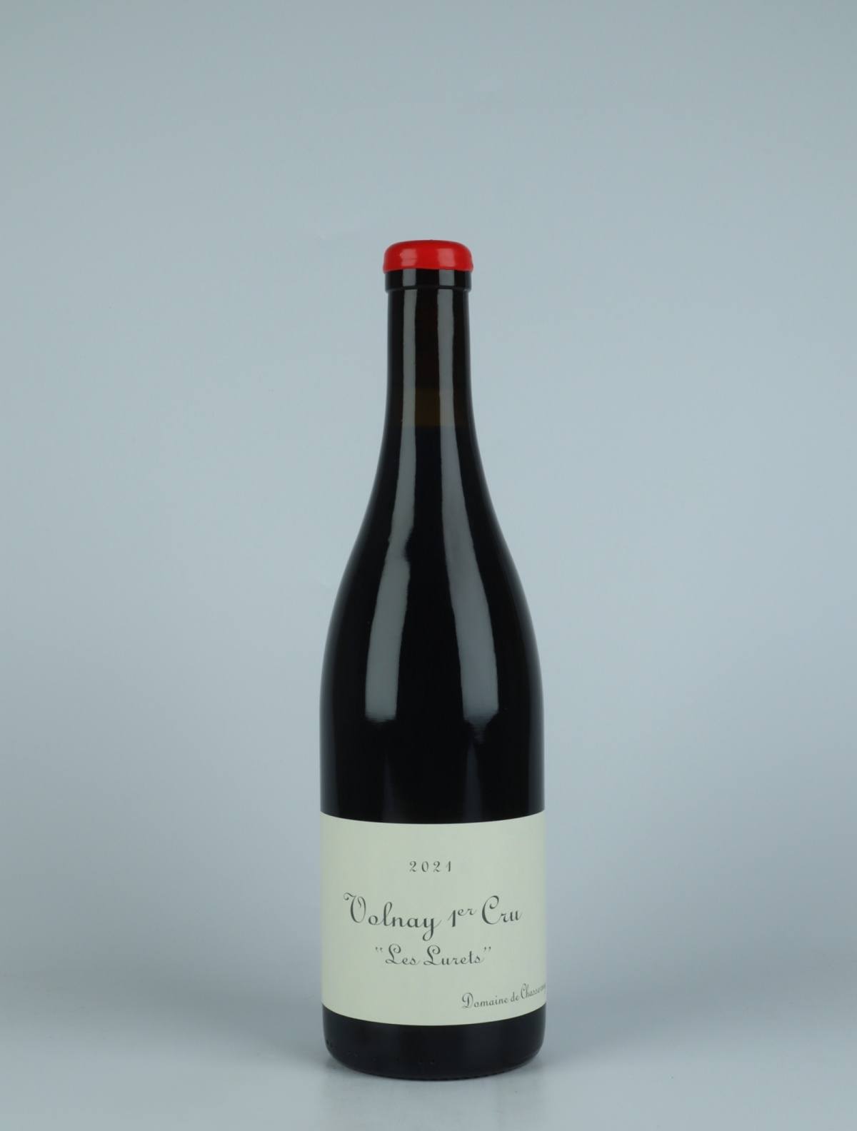 A bottle 2021 Volnay 1. Cru - Les Lurets Red wine from Domaine de Chassorney, Burgundy in France
