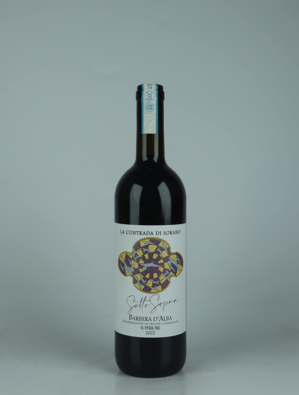 A bottle 2022 Barbera d'Alba Superiore - Sotto Sopra Red wine from La Contrada di Sorano, Piedmont in Italy