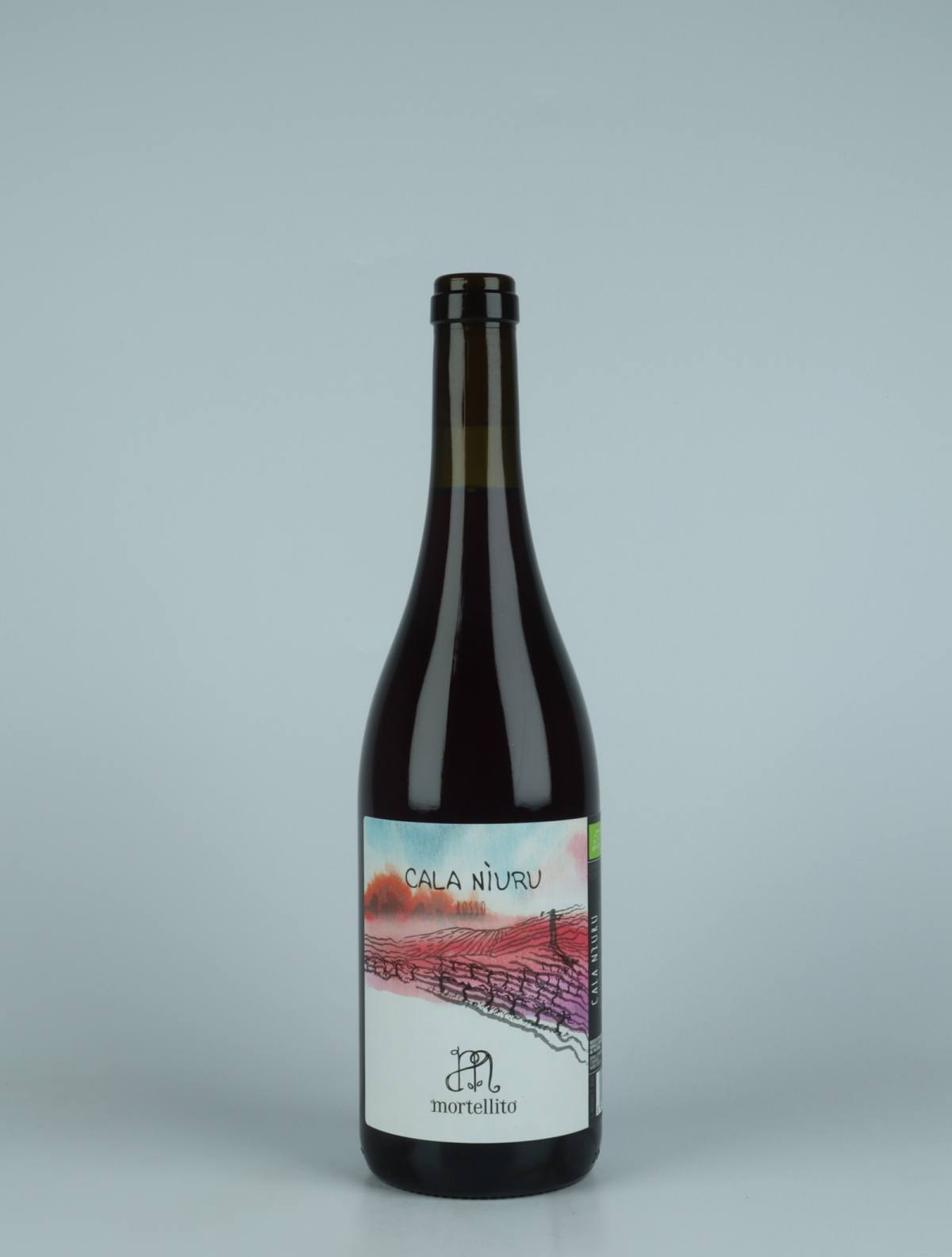 A bottle 2022 Cala Niuru - Rosso Red wine from Il Mortellito, Sicily in Italy