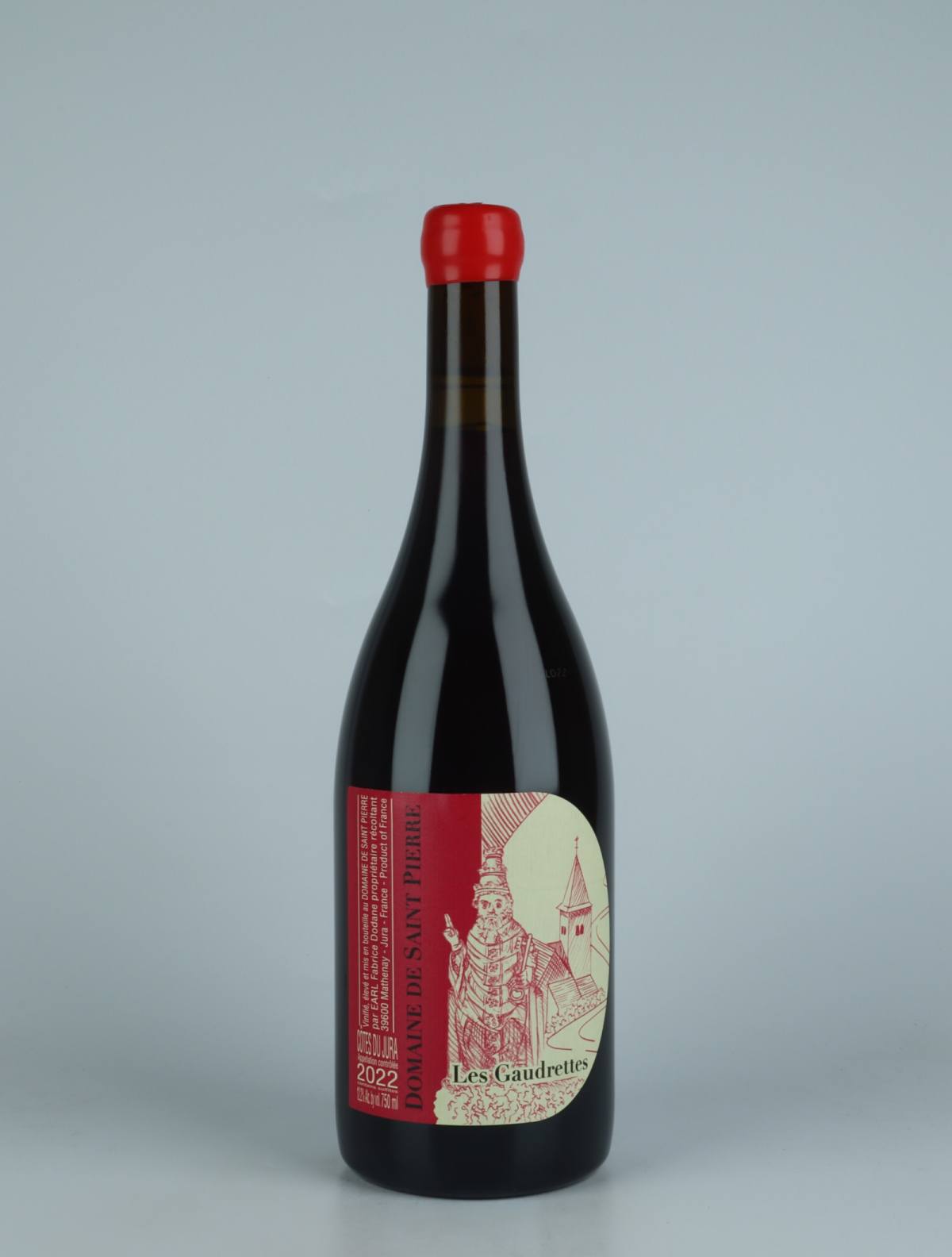 A bottle 2022 Côtes du Jura Rouge - Les Gaudrettes Red wine from Domaine de Saint Pierre, Jura in France