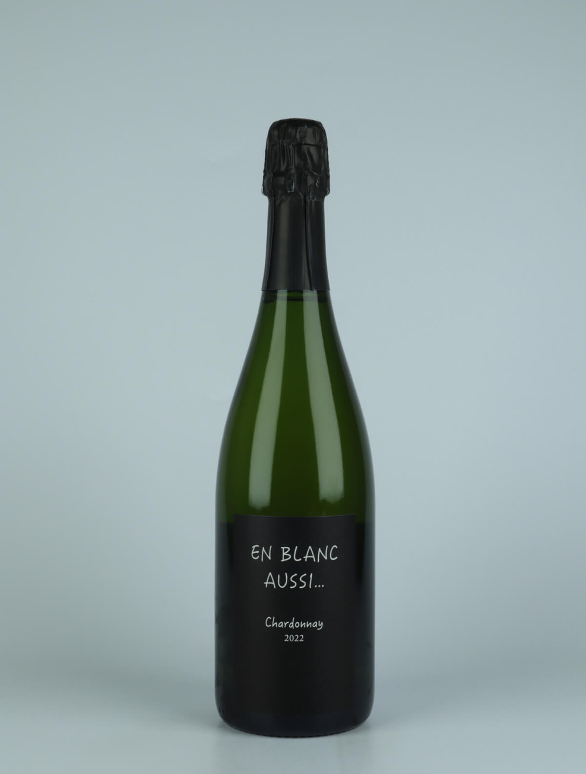 A bottle 2022 En Blanc Aussi Sparkling from Renardat Fache, Bugey in France
