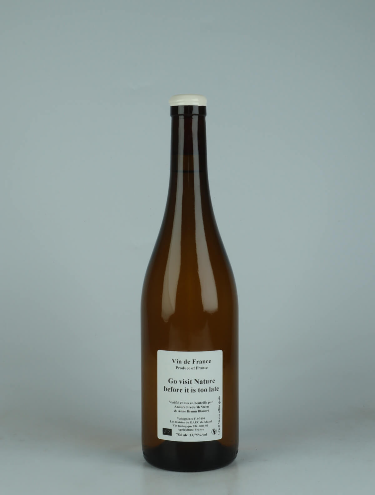 A bottle 2022 Go visit nature before it is too late White wine from Anders Frederik Steen & Anne Bruun Blauert, Ardèche in France