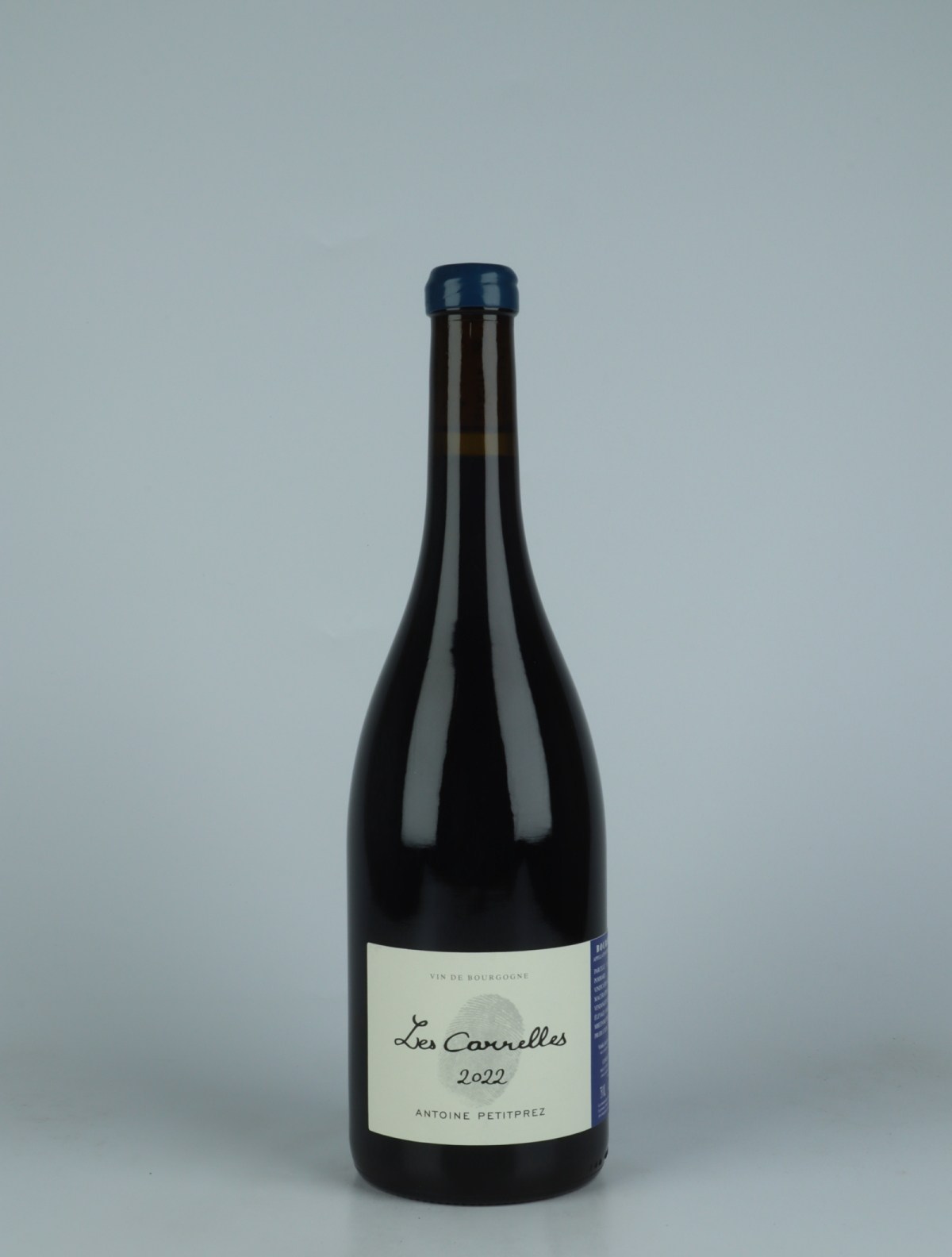 A bottle 2022 Les Carelles Red wine from Antoine Petitprez, Burgundy in France