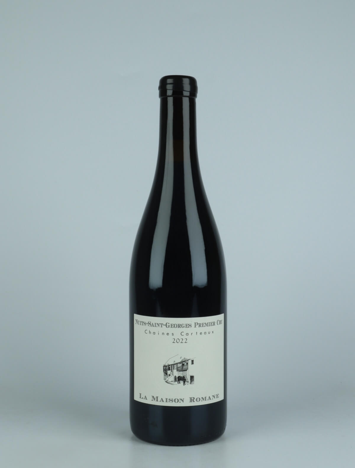 A bottle 2022 Nuits Saint Georges 1. Cru - Chaines Carteaux Red wine from La Maison Romane, Burgundy in France