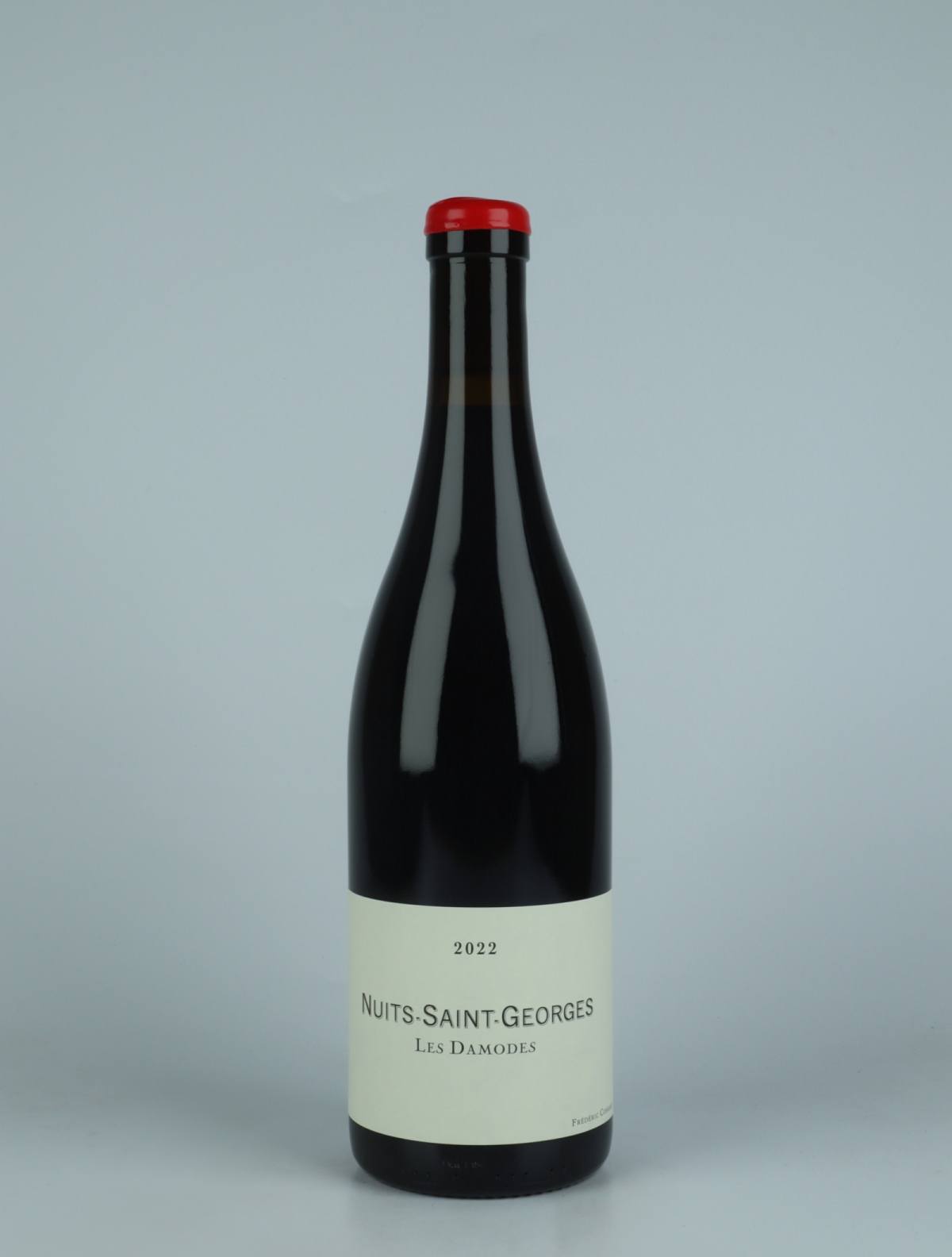 A bottle 2022 Nuits Saint Georges - Les Damodes Red wine from Frédéric Cossard, Burgundy in France
