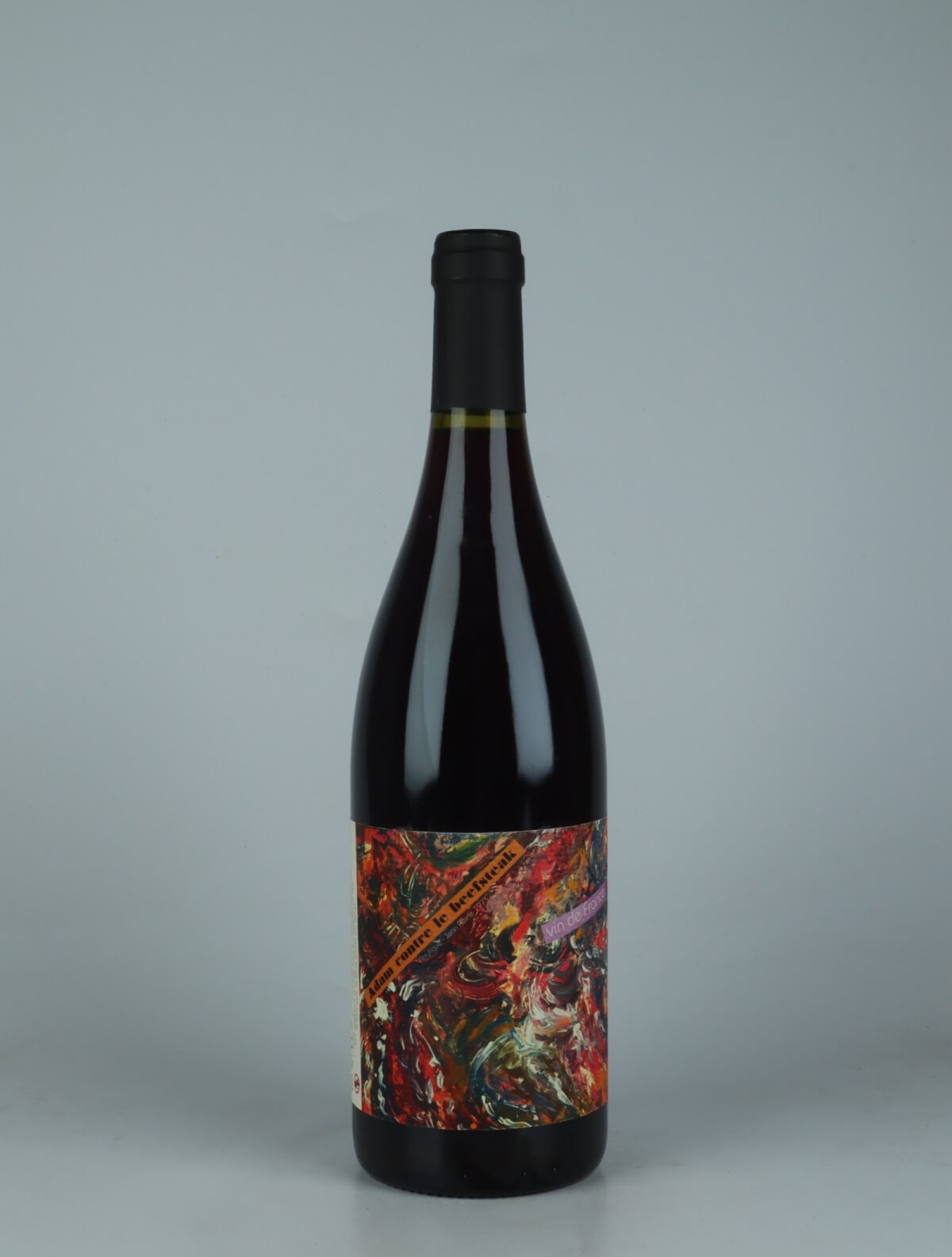 A bottle 2023 Adam Contre le Beefsteack Red wine from Daniel Sage, Haute-Loire in France