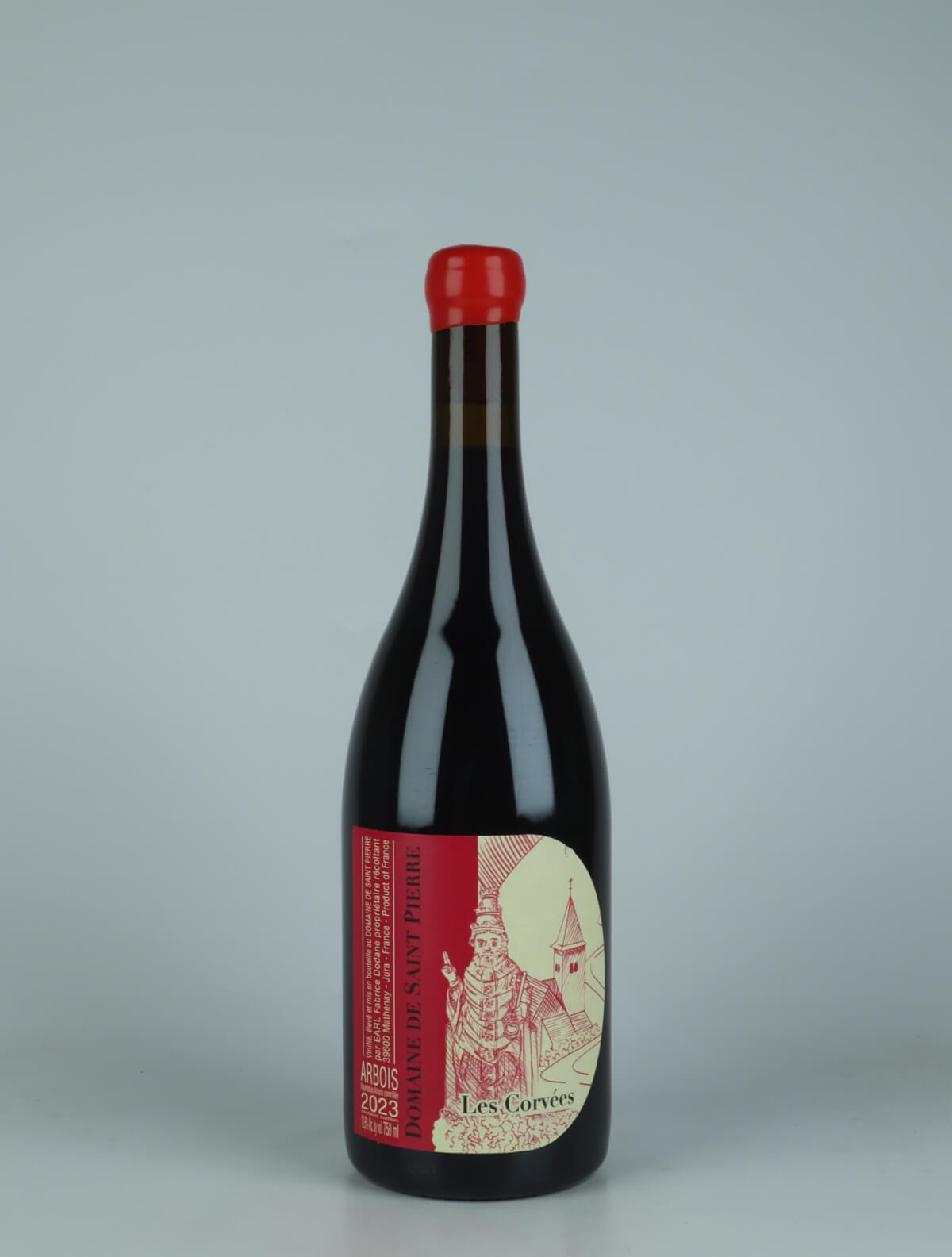 A bottle 2023 Arbois Rouge - Les Corvées Red wine from Domaine de Saint Pierre, Jura in France