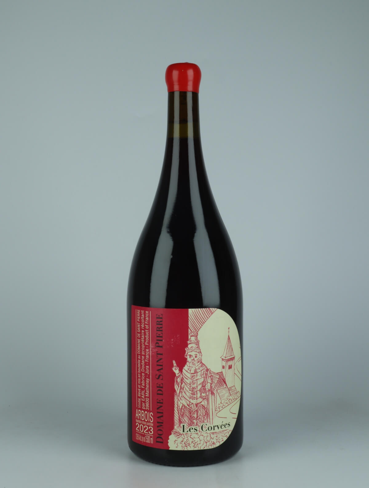 A bottle 2023 Arbois Rouge - Les Corvées - Magnum Red wine from Domaine de Saint Pierre, Jura in France