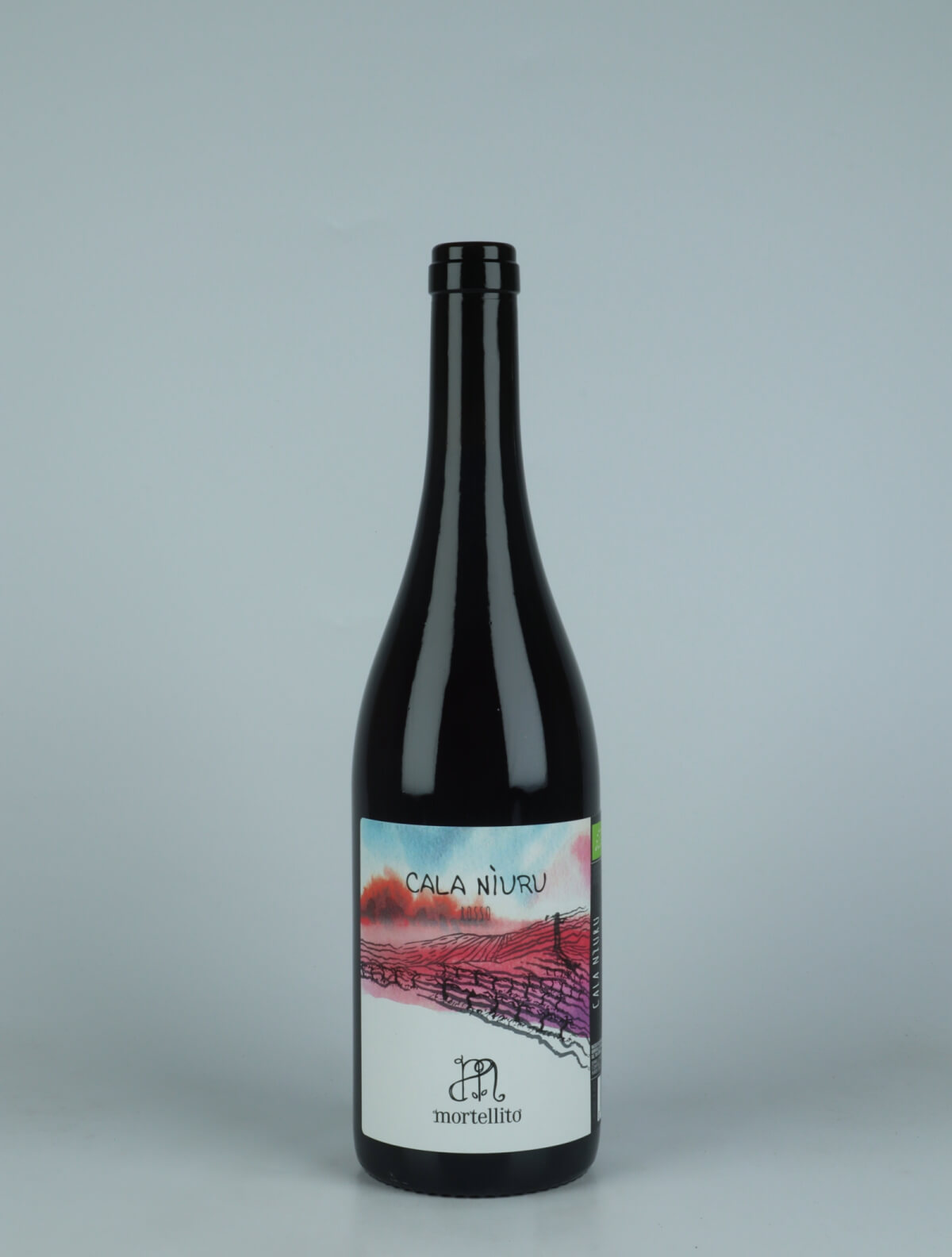 A bottle 2023 Cala Niuru - Rosso Red wine from Il Mortellito, Sicily in Italy