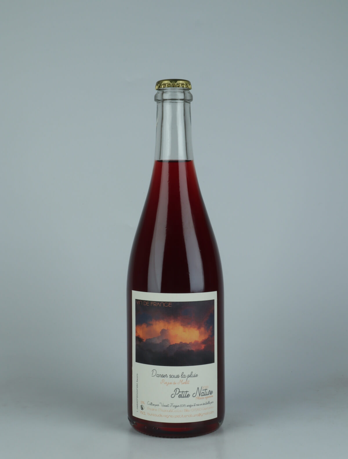 A bottle 2023 Danser Sous la Pluie Red wine from Petite Nature, Ardèche in France