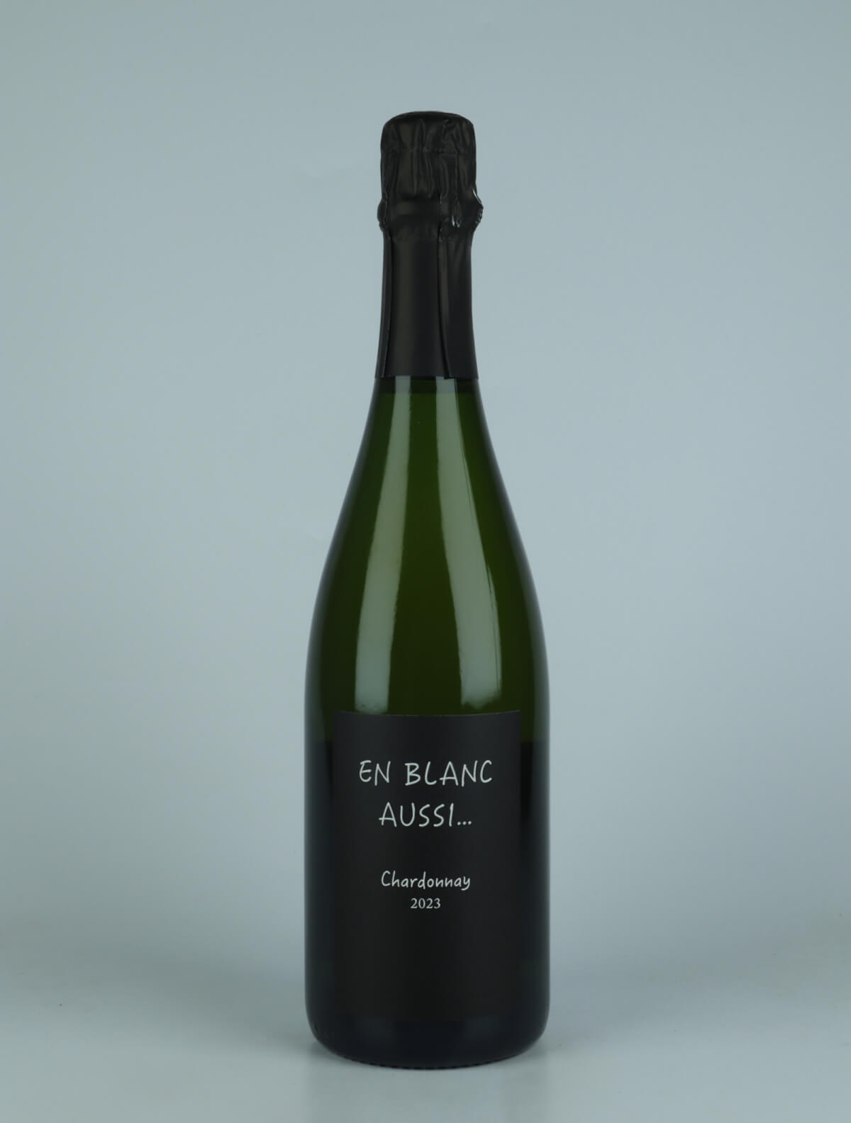 A bottle 2023 En Blanc Aussi Sparkling from Renardat Fache, Bugey in France