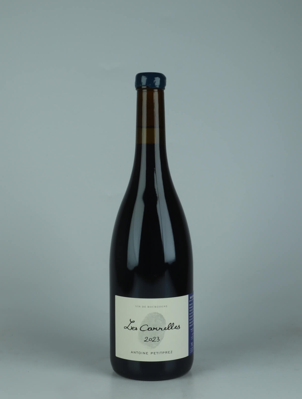 A bottle 2023 Les Carelles Red wine from Antoine Petitprez, Burgundy in France