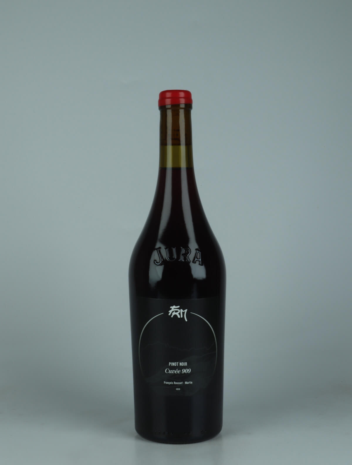 En flaske 2023 Pinot Noir - 909 En Beuzard Rødvin fra François Rousset-Martin, Jura i Frankrig