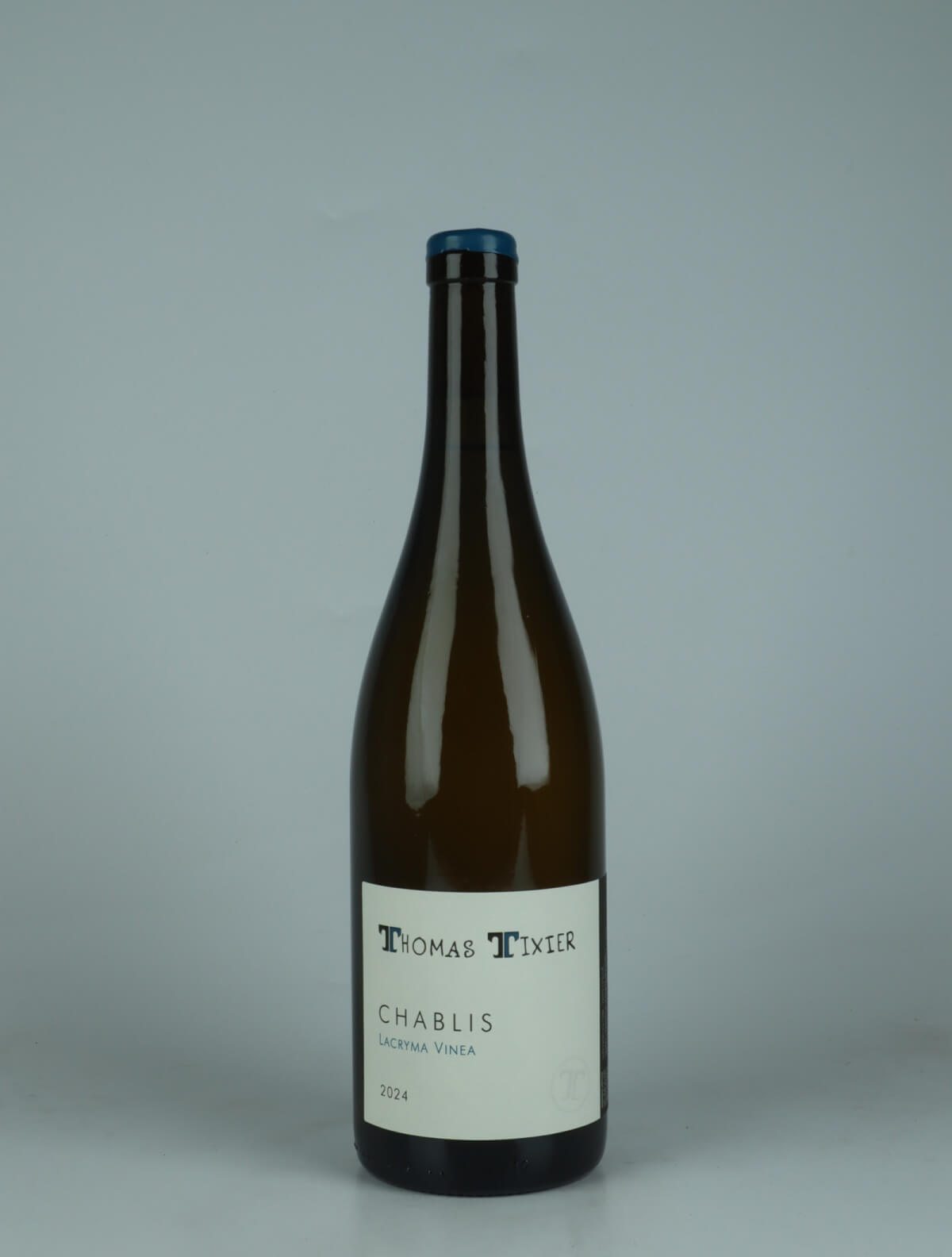 A bottle 2024 Chablis - Lacryma Vinea White wine from Thomas Tixier, Burgundy in France