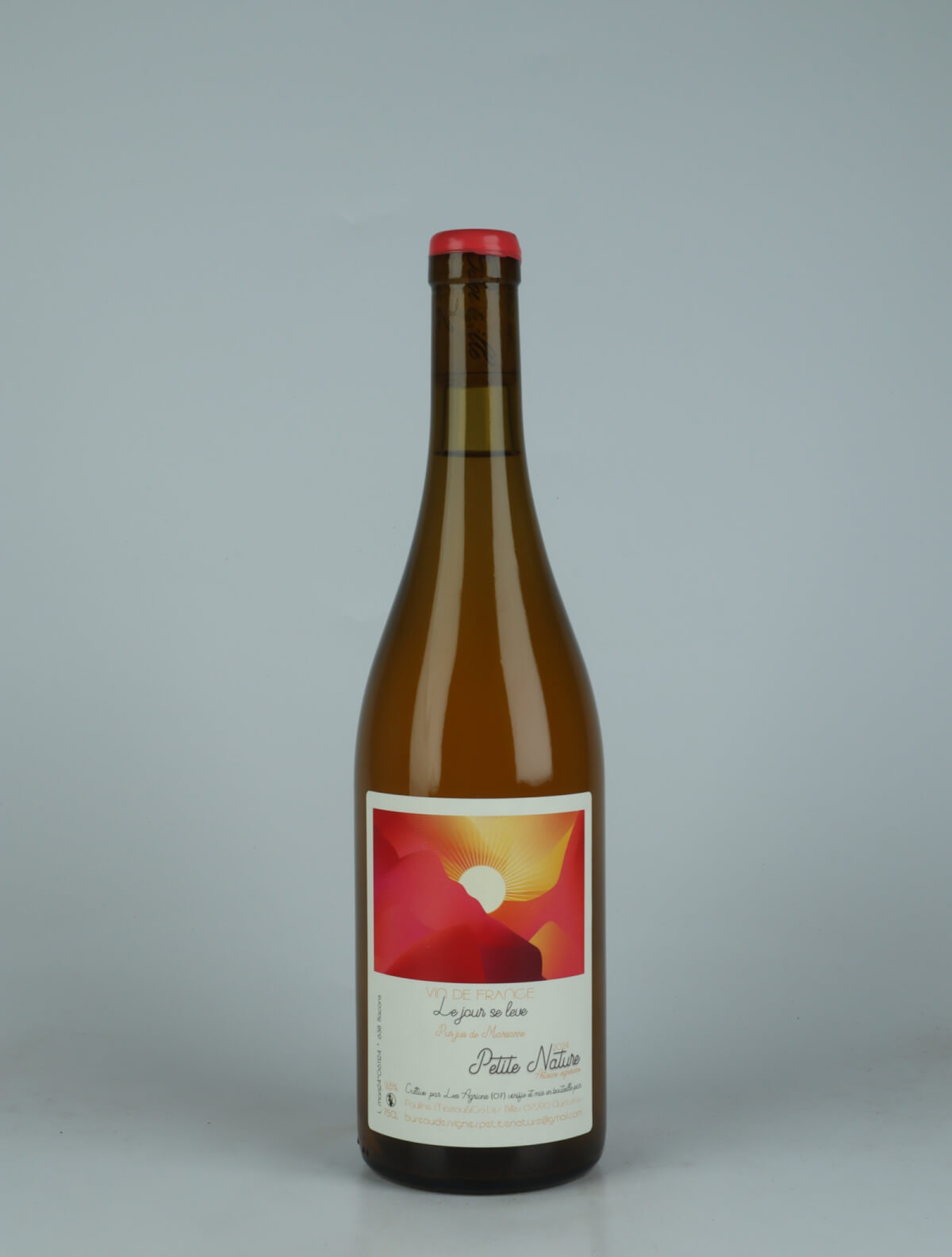 A bottle 2024 Le Jour se Lève Orange wine from Petite Nature, Ardèche in France