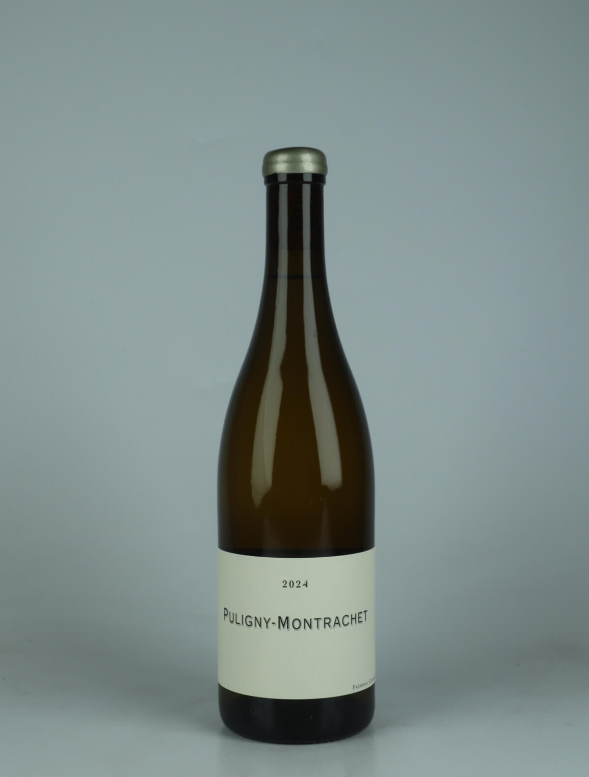 A bottle 2024 Puligny Montrachet White wine from Frédéric Cossard, Burgundy in France