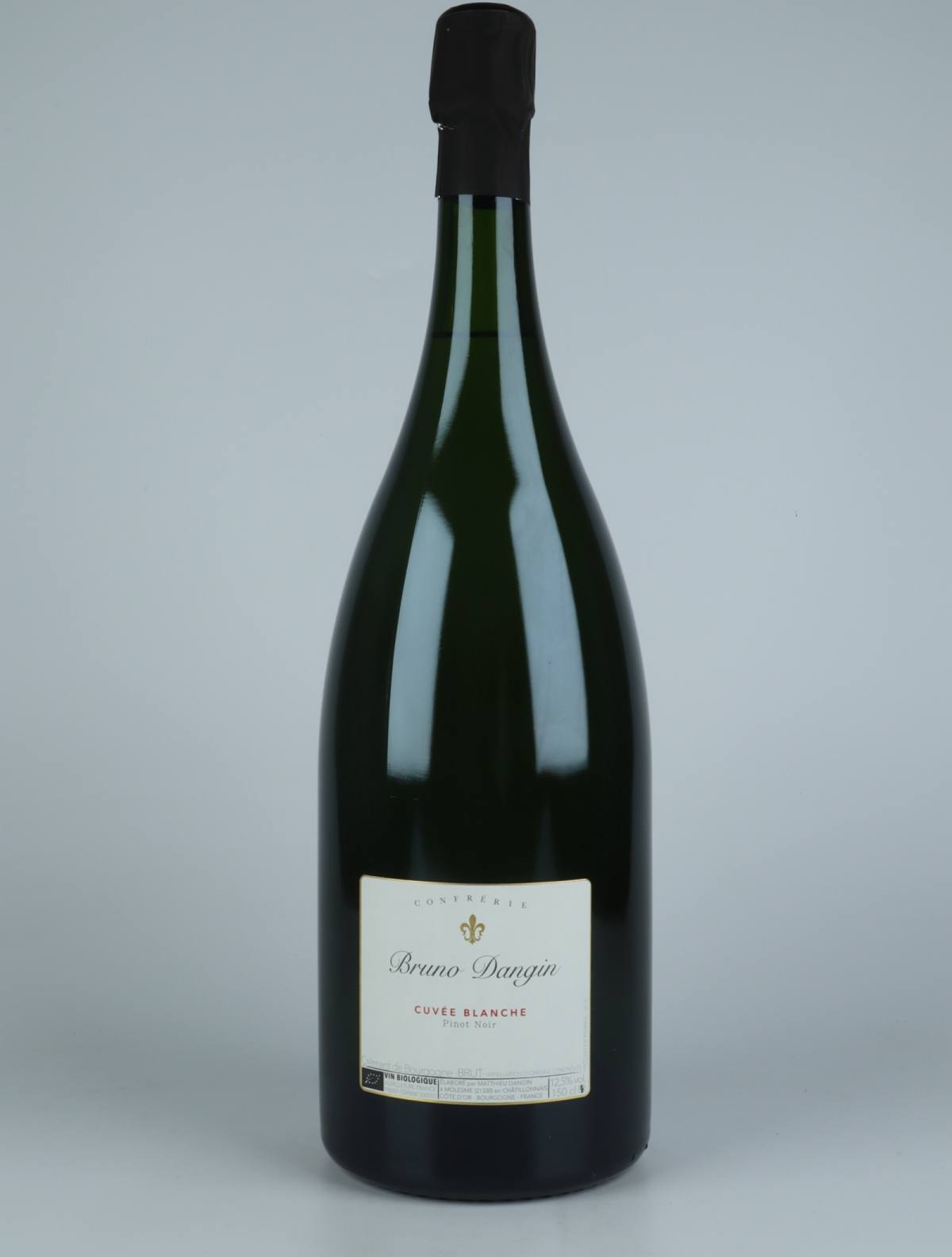 A bottle N.V. Crémant Brut - Cuvée Blanche Sparkling from Domaine Bruno Dangin, Burgundy in France